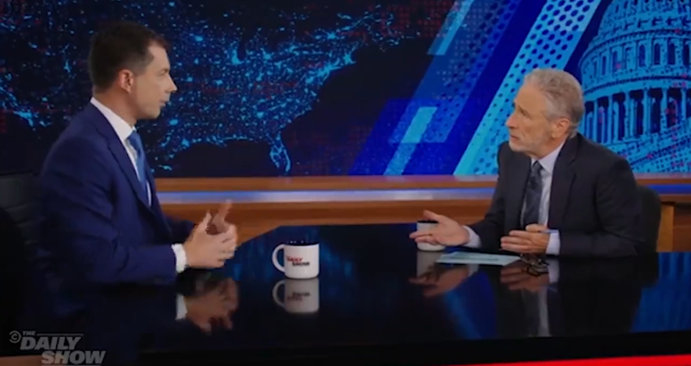 Pete Buttigieg (left) speaks to Jon Stewart (right) on The Daily Show on June 29. Buttigieg criticized Donald Trump for using Hulk Hogan and Kid Rock to ‘appeal to the working man’ at the Republican National Convention earlier this month